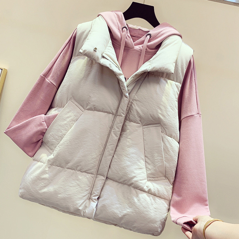 Alkalmi női mellény fehér és fekete színben, cipzárral és zsebekkel