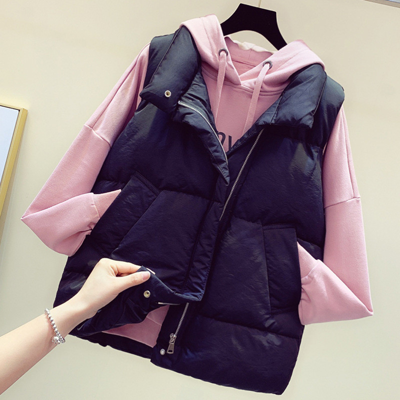 Alkalmi női mellény fehér és fekete színben, cipzárral és zsebekkel