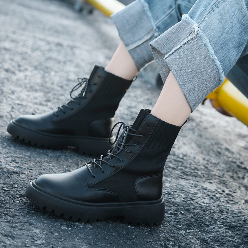 Női bőrcsizma fűzővel és durva talppal, fekete színben