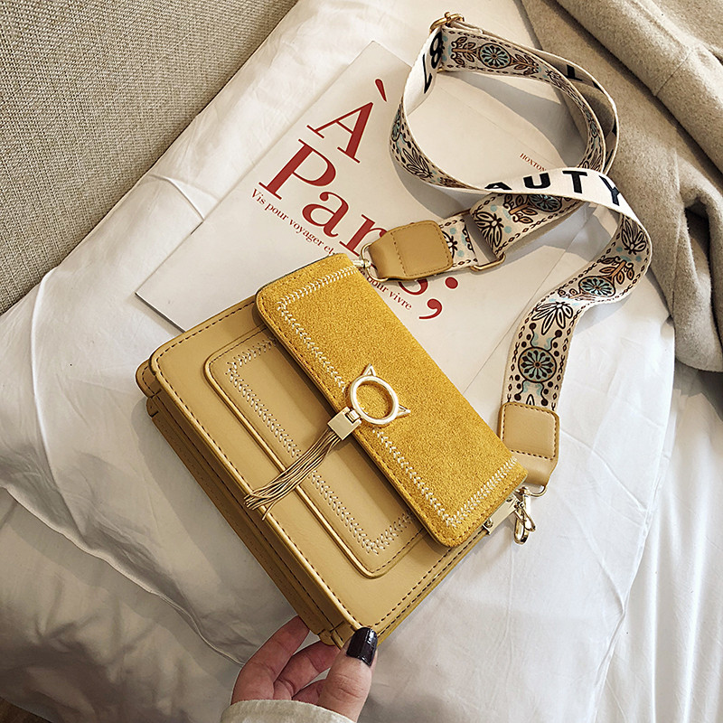 Fém díszítéssel ellátott női táska több színben