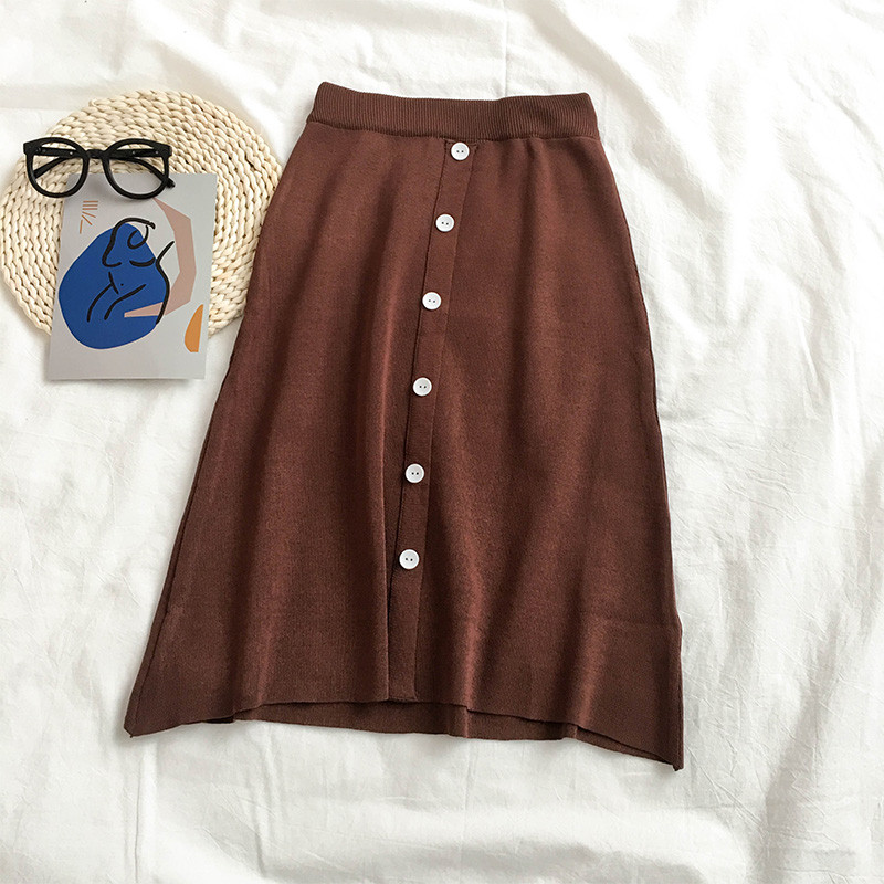 Női szoknya barna és fekete színben, gombokkal