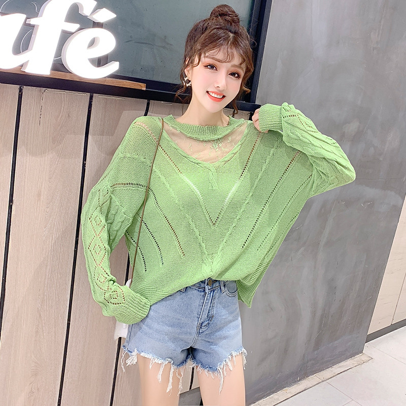 Női kötött széles blúz zöld-fehér színben