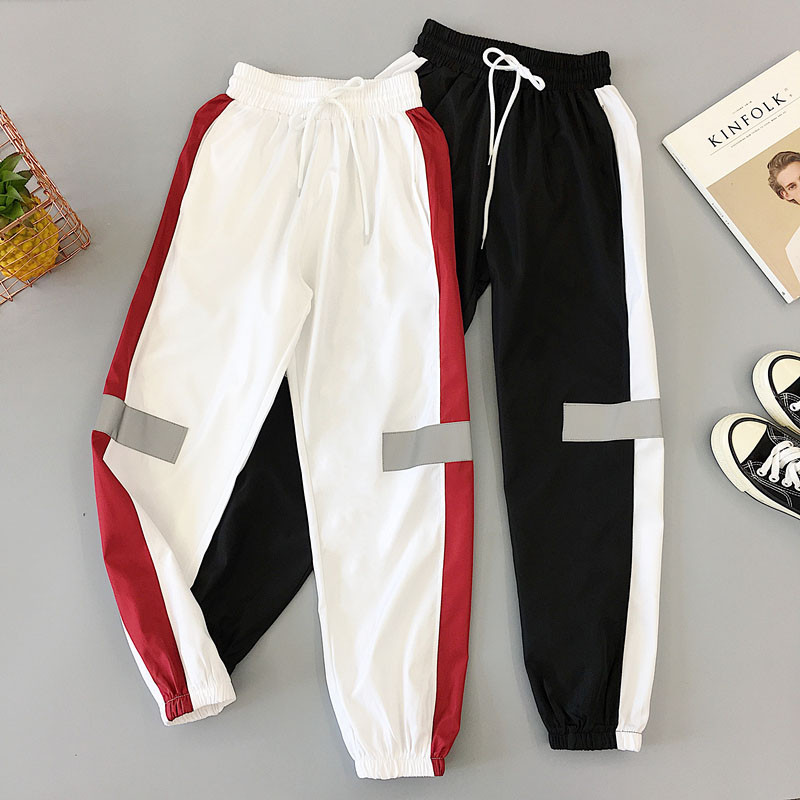 Women`s sports pants in black and white