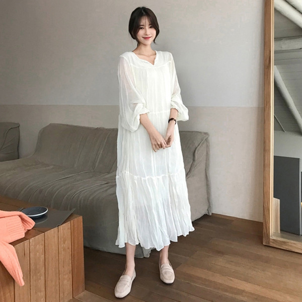 Γυναικείο καθημερινό φόρεμα  με φαρδιά και μακριά μανίκια