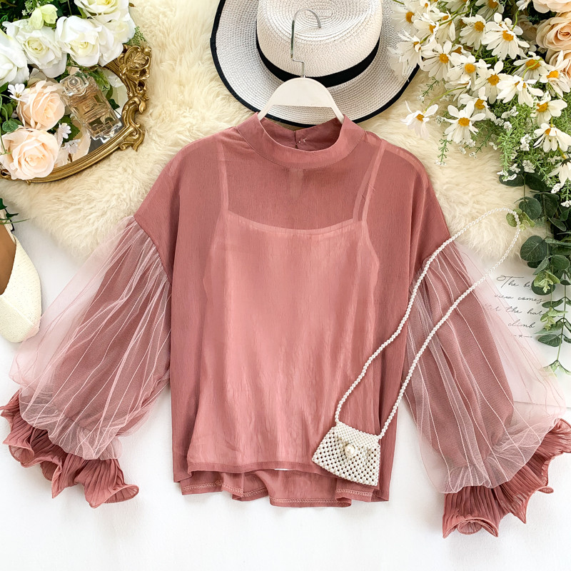 Modern női blúz ovális nyakkivágással és széles ujjakkal, többféle színben