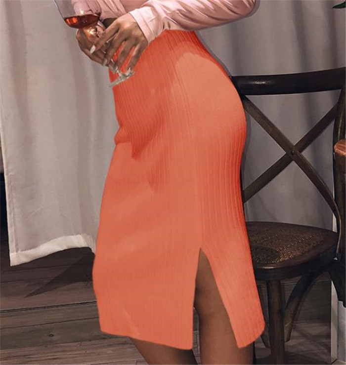 Modern női szoknya magas derékkal és hasítékkal, különböző színekben