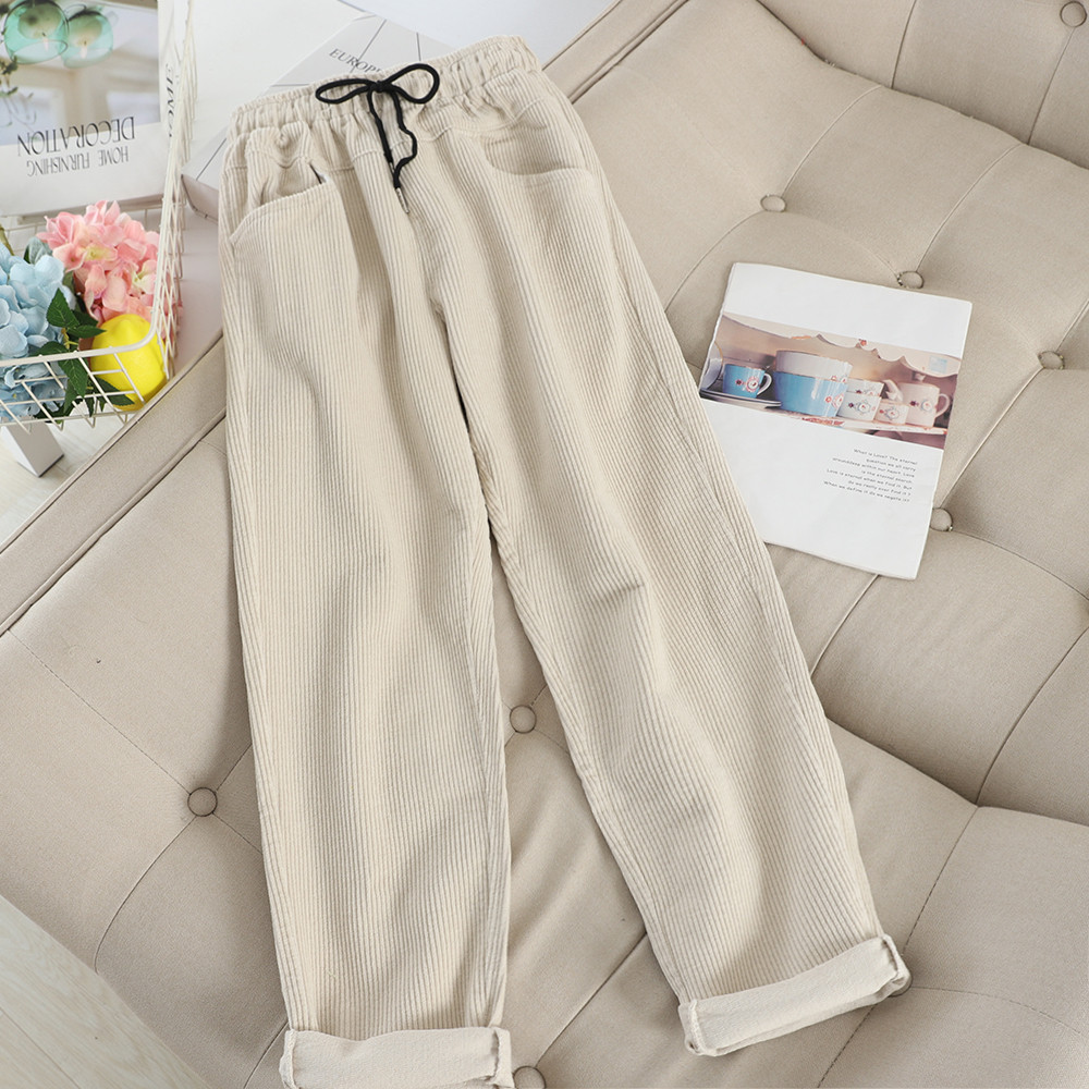 Aktuális női nadrág gumírozott derékkal és zsebekkel több színben