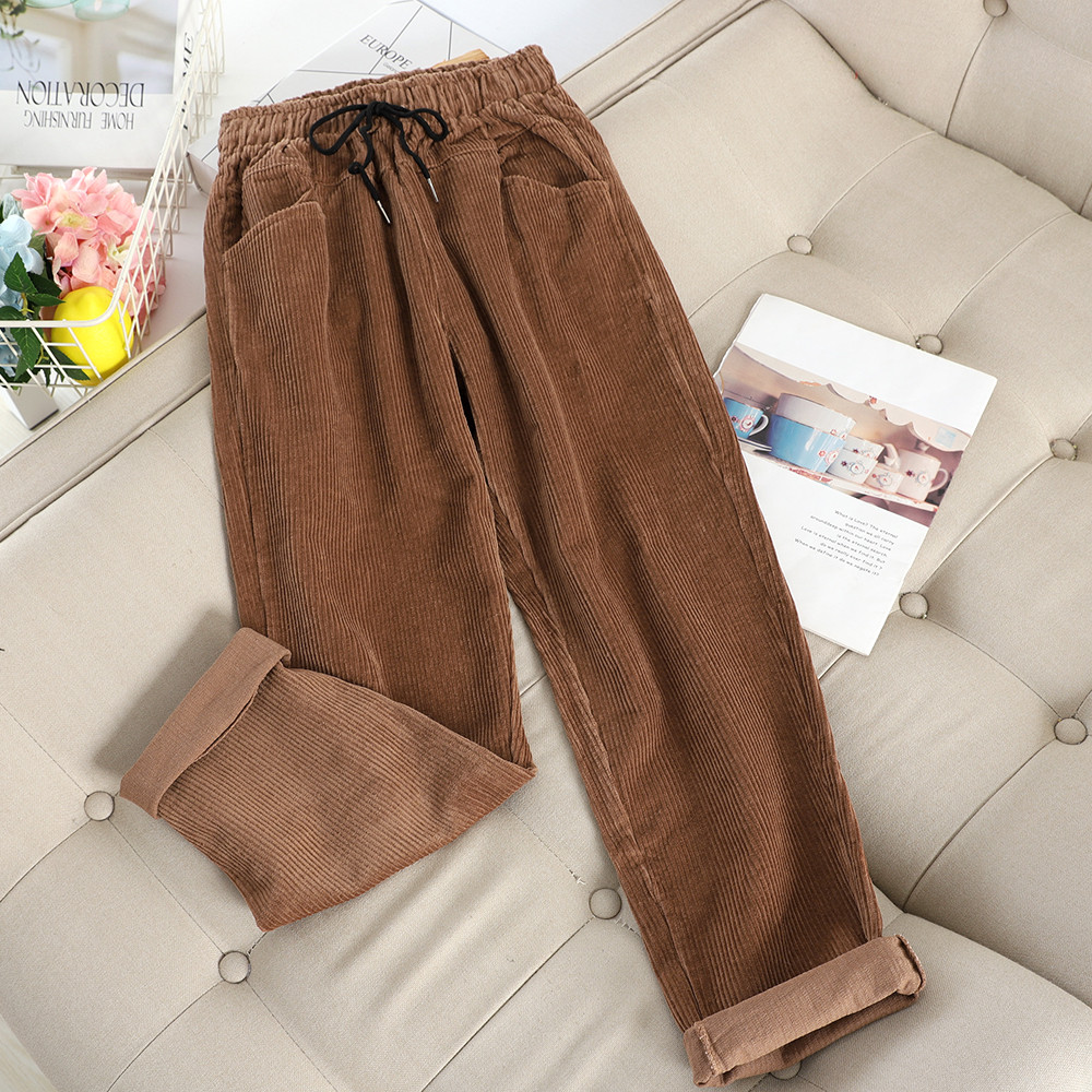 Aktuális női nadrág gumírozott derékkal és zsebekkel több színben