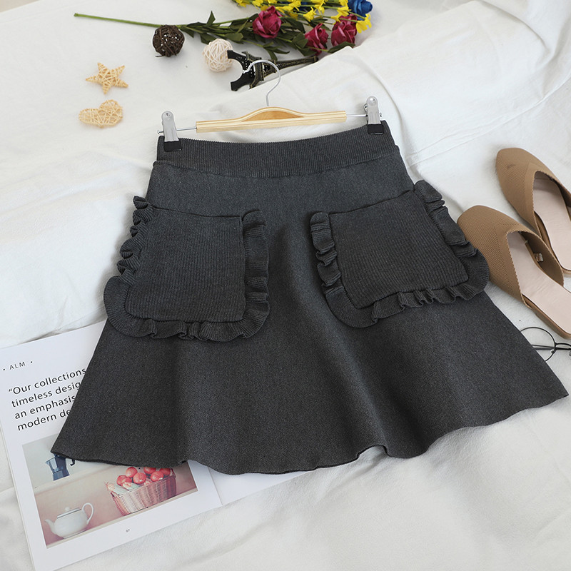 Női szoknya négy színben zsebre vágott modellel