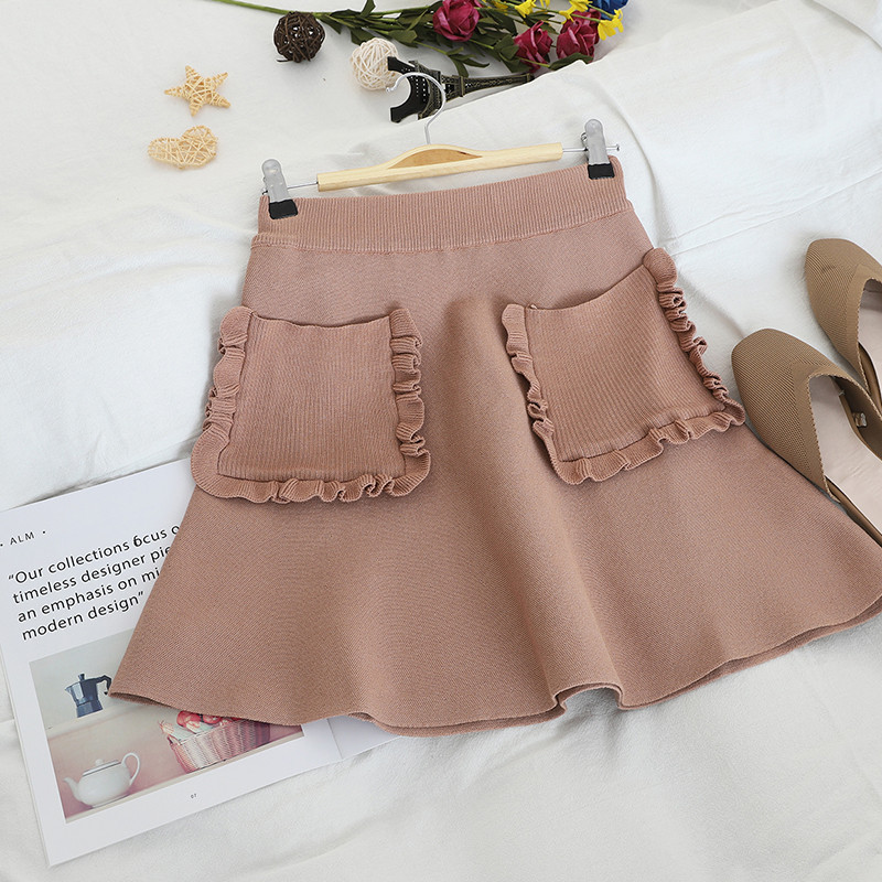 Női szoknya négy színben zsebre vágott modellel