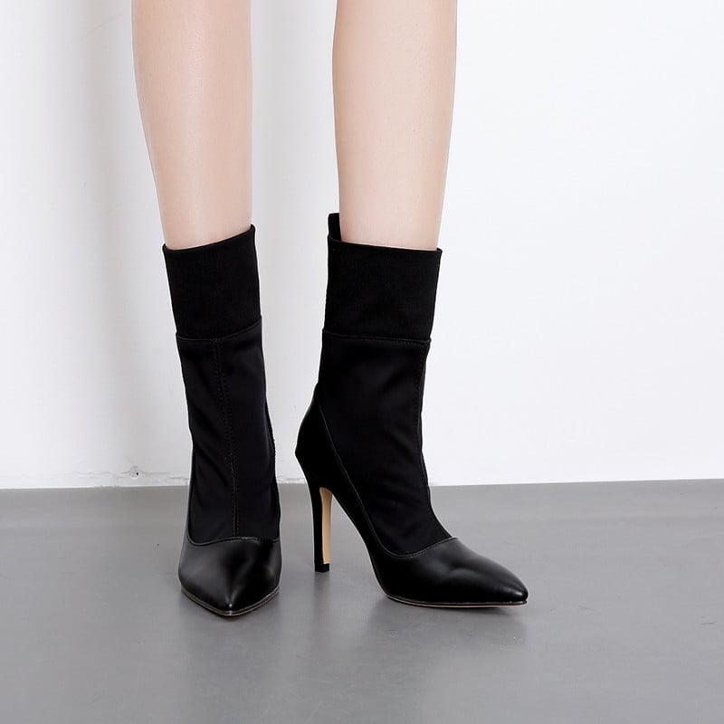 Νέο μοντέλο μοντέρνες γυναικείες μπότες με λεπτό τακούνι σε μαύρο χρώμα