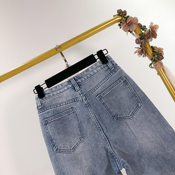 Γυναικεία  τζιν - ευρύ μοντέλο με σκισμένο μοτίβο και υψηλή μέση