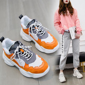 Μοντέρνα γυναικεία αθλητικά παπούτσια με χοντρή σόλα σε λευκό και πορτοκαλί χρώμα