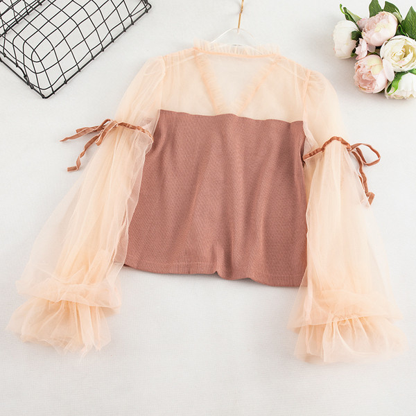 Stílusos női ing fekete és rózsaszín színben gombokkal és V-nyakkal