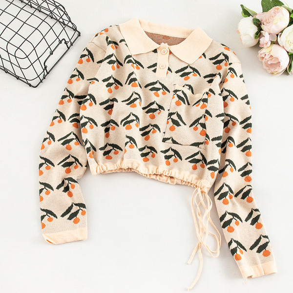 Női pulóver két színben klasszikus gallérral és zsebbel