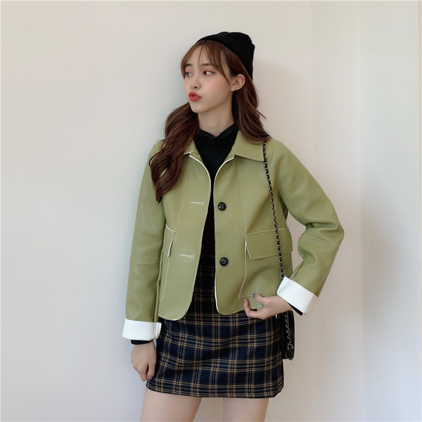 Női alkalmi kabát eko bőrből - széles modell zöld és fekete színben