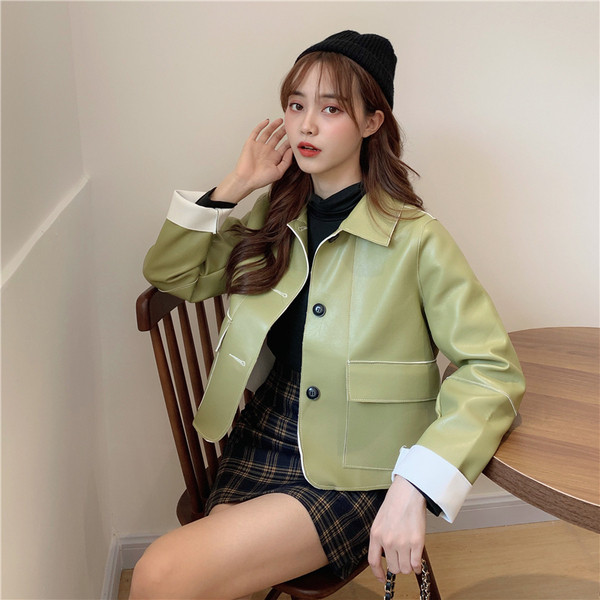 Női alkalmi kabát eko bőrből - széles modell zöld és fekete színben