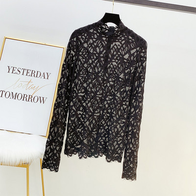 Női csipkeblúz fehér és fekete cipzárral