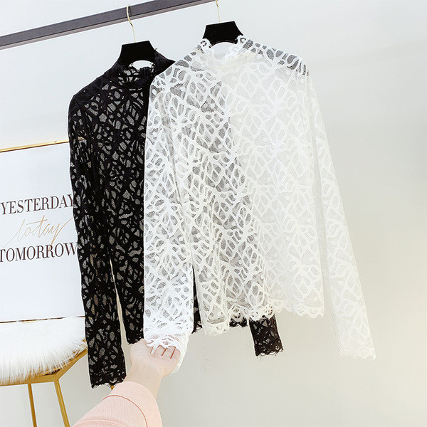 Női csipkeblúz fehér és fekete cipzárral