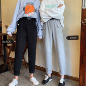 Női sportnadrág szürke és fekete színben, zsebekkel