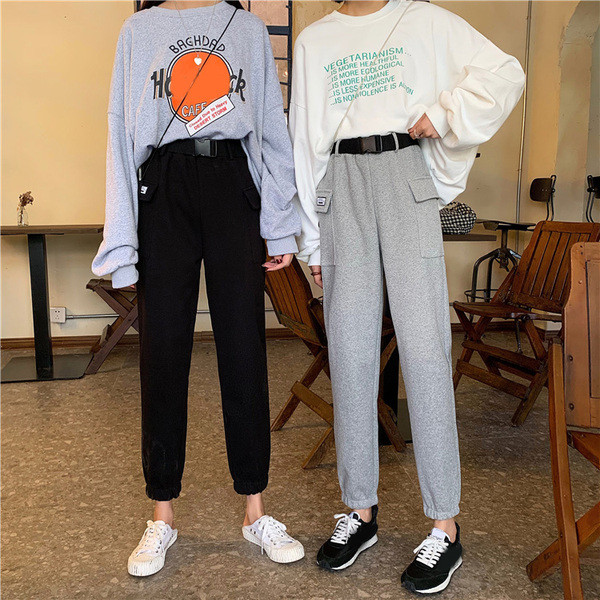 Női sportnadrág szürke és fekete színben, zsebekkel