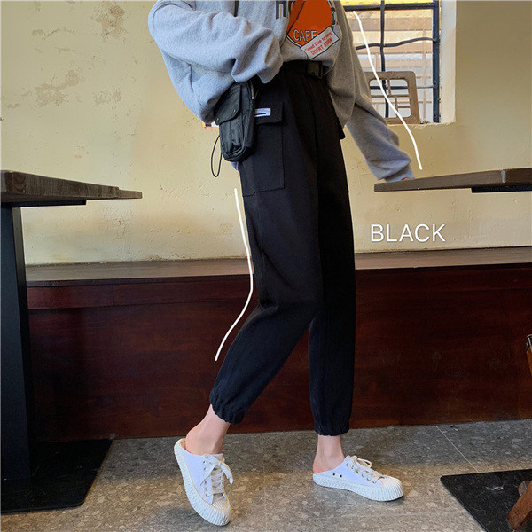 Női sportnadrág szürke és fekete színben, zsebekkel