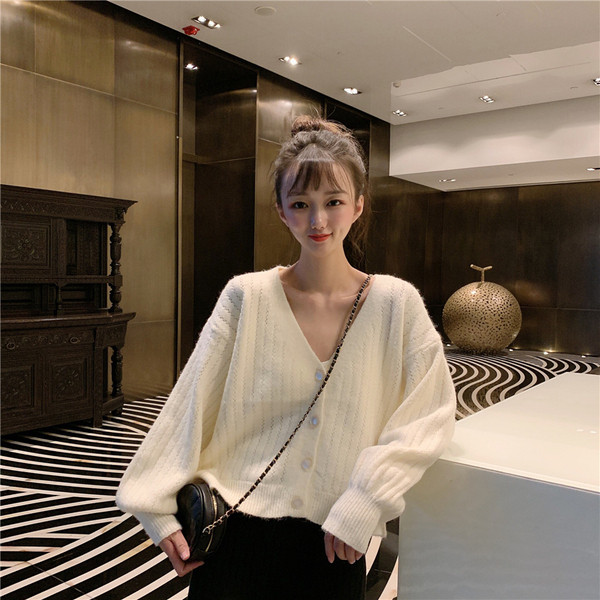 Női rövid mellény fehér zöld és piros színben