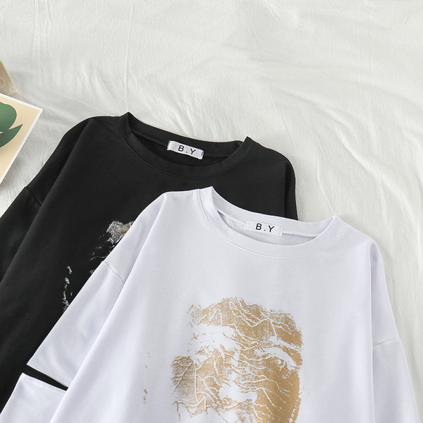 Alkalmi női blúz fehér és fekete rátéttel