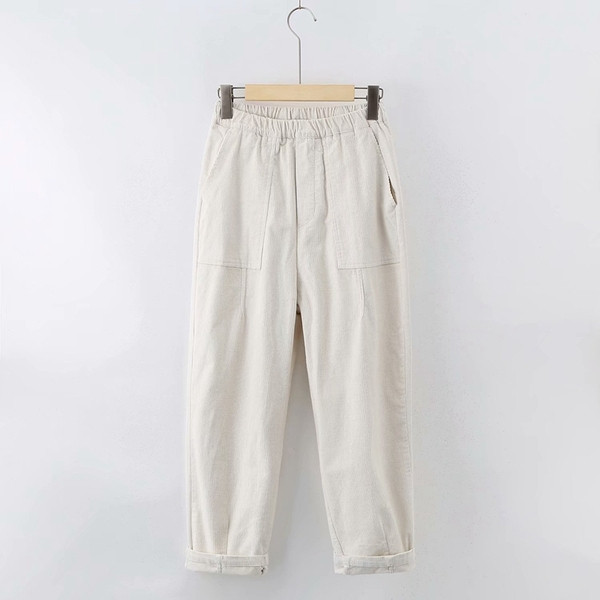 Korszerű, zsebes női nadrág - széles modell több színben