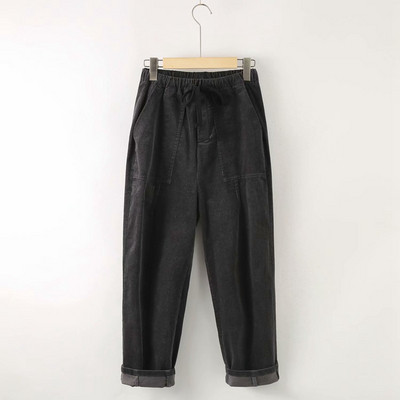 Modern női nadrág zsebekkel és nyakkendőkkel - széles modell