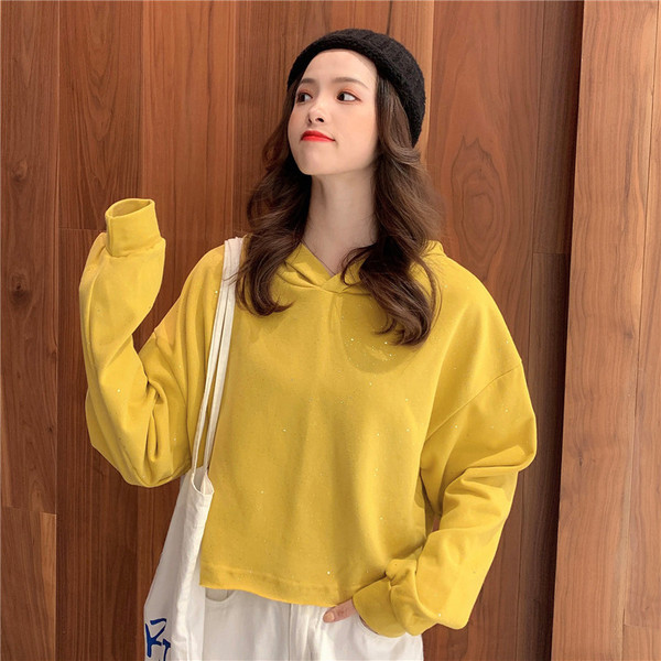 Modern női pulóver három színben kapucnival