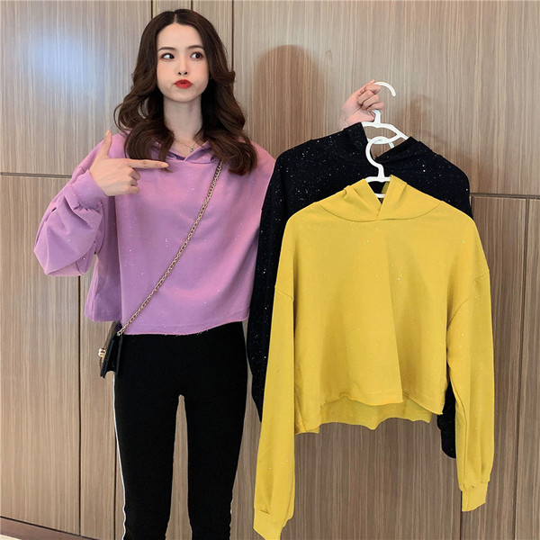 Modern női pulóver három színben kapucnival