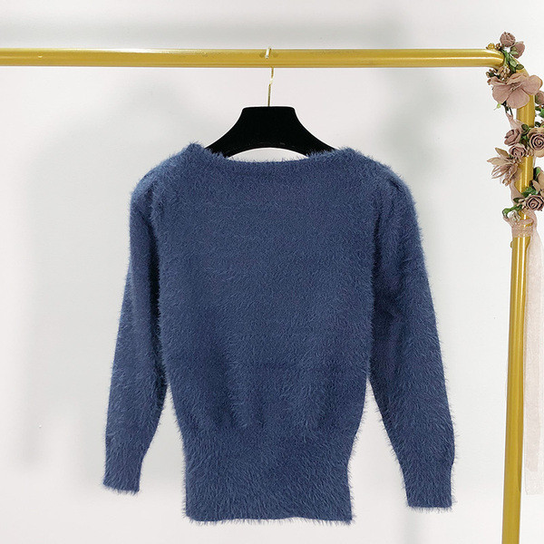 Vastag női blúz ovális nyakkivágással és hosszú ujjú kék és fekete színben