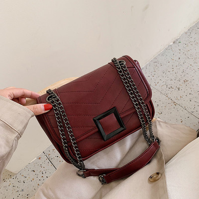 Modern női táska fém rögzítéssel több színben