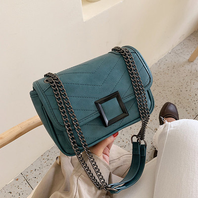 Modern női táska fém rögzítéssel több színben