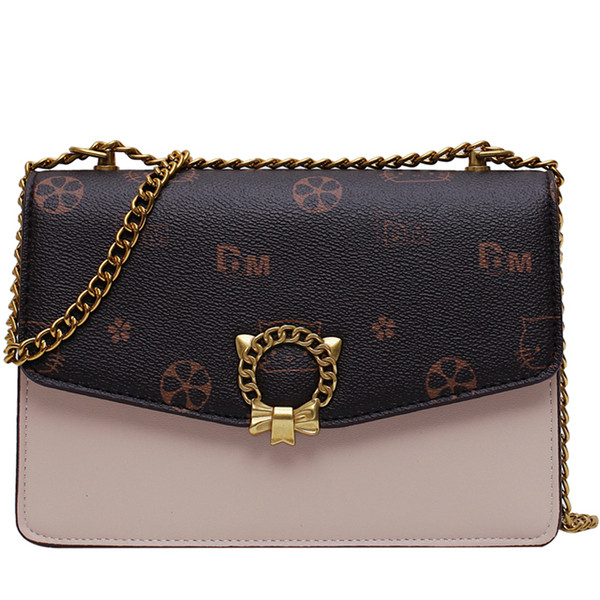 Stílusos kézitáska fém elemekkel több színben