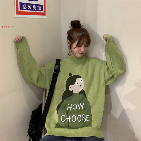 Zöld színű női blúz rátéttel - széles modell