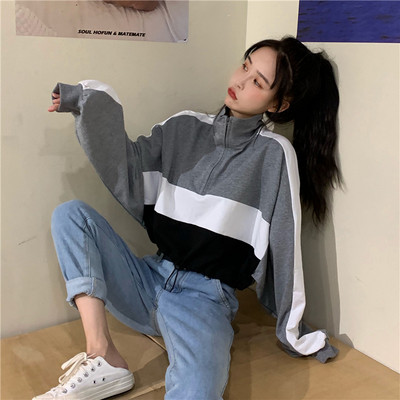 Női rövid blúz két színben, cipzárral