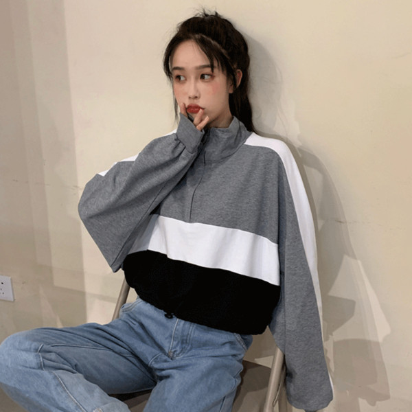 Női rövid blúz két színben, cipzárral