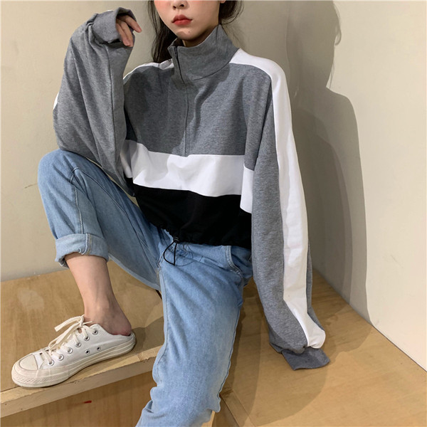 Női rövid blúz két színben, cipzárral