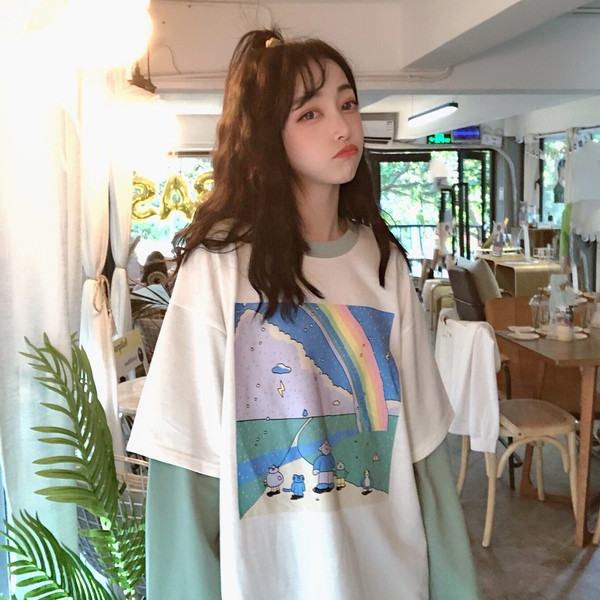 Női alkalmi blúz széles modell rátéttel