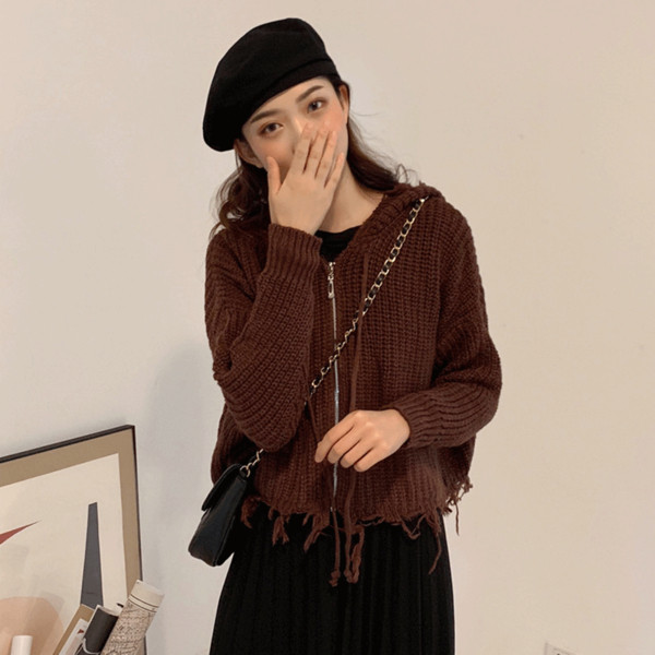 Fekete bézs és barna színű női mellény cipzárral