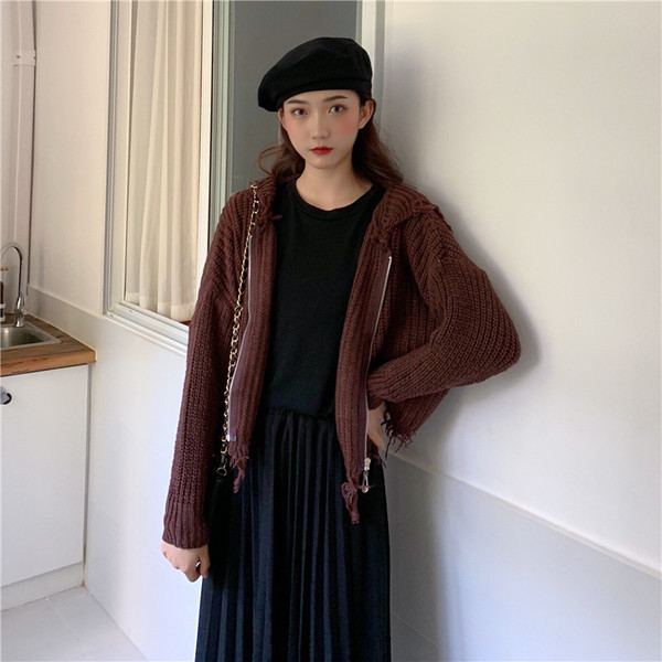 Fekete bézs és barna színű női mellény cipzárral