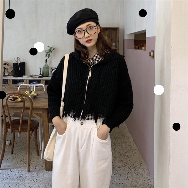 Fekete bézs és barna színű női mellény cipzárral