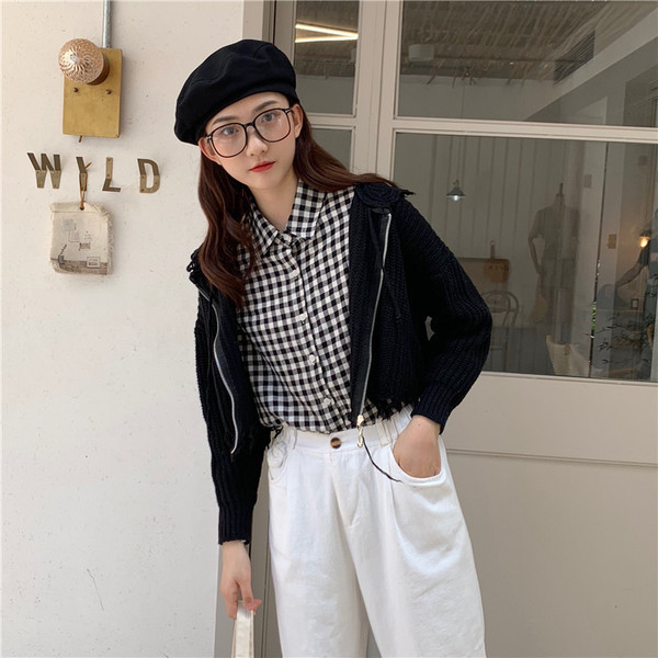 Fekete bézs és barna színű női mellény cipzárral