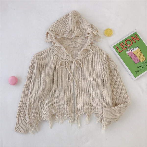 Fekete bézs és barna színű női mellény cipzárral