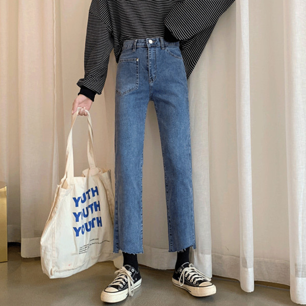 Női farmer kék színben, zsebbel és magas derékkal