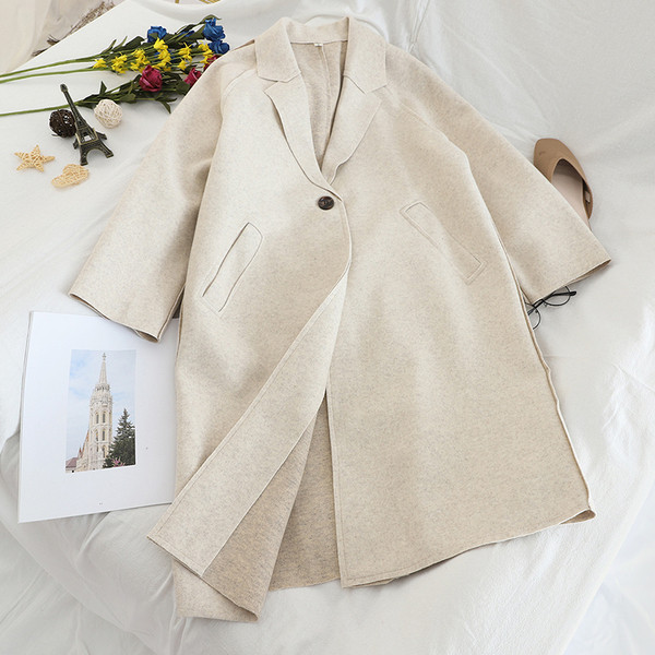 Női őszi kabát széles modell zsebekkel több színben