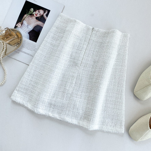 Stílusos női szoknya gombokkal, három színben