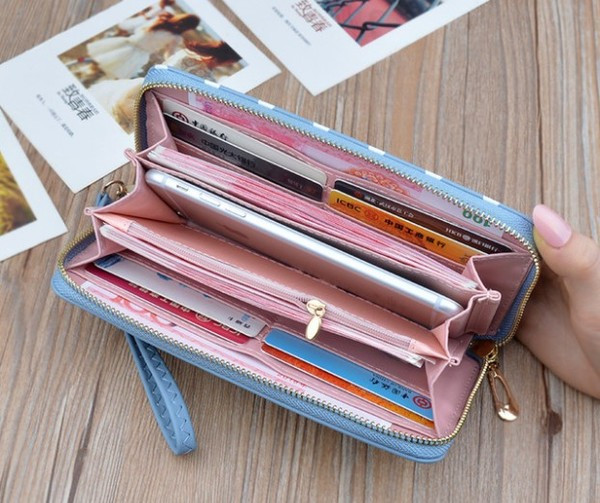 Geanta de dama cu puncte in albastru, rosu, roz si negru